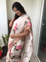 Ivory Printed Linen Saree adorned with Zari and contrast pink piping - Image 2