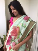 Sea Green Printed Linen Saree adorned with Zari Weaves