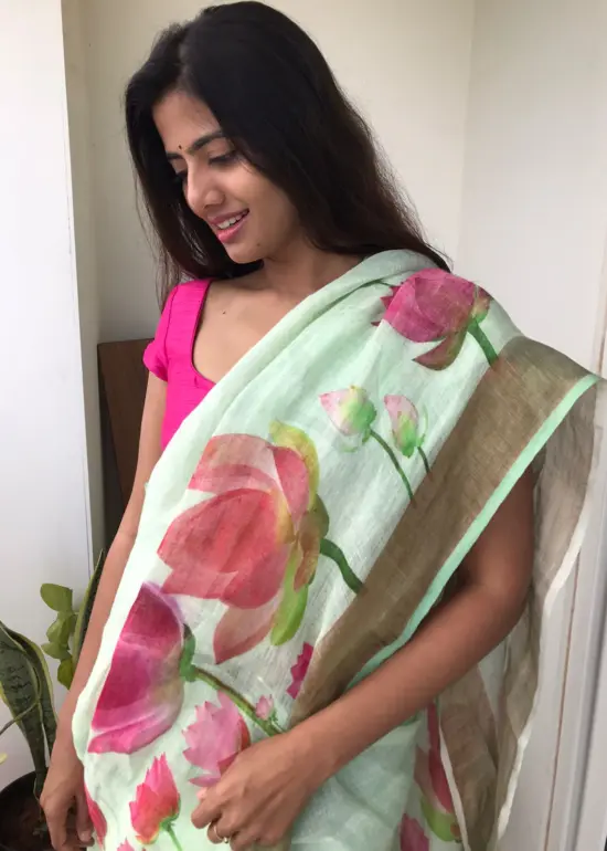 Sea Green Printed Linen Saree adorned with Zari Weaves