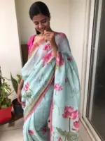 Baby Blue Printed Linen Saree adorned with Zari Weaves