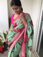 Sea Green Printed Linen Saree adorned with Zari Weaves