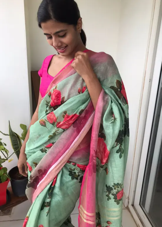 Sea Green Printed Linen Saree adorned with Zari Weaves