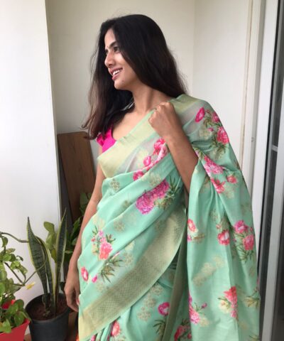 Sea Green Linen Silk Saree with Beautiful Prints and Zari Buttas all over