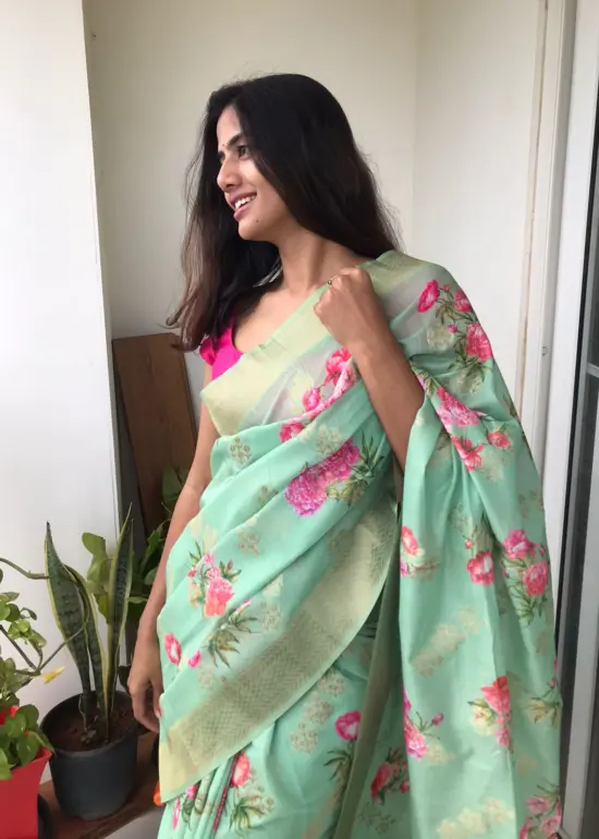 Sea Green Linen Silk Saree with Beautiful Prints and Zari Buttas all over