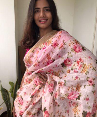 Offwhite Printed Linen Saree adorned with Zari Weaves