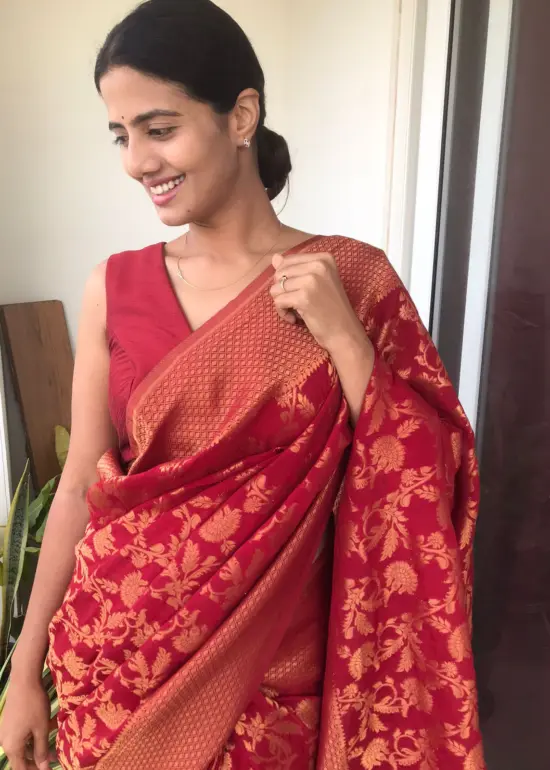 Maroon Chiffon Saree highlighted with Antique Gold Zari Weaves