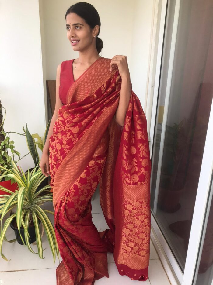 Maroon Chiffon Saree highlighted with Antique Gold Zari Weaves