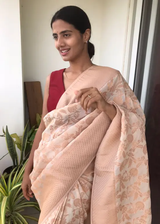 Ivory Chiffon Saree highlighted with Antique Gold Zari Weaves