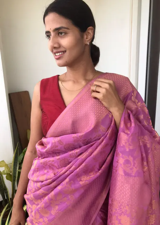 Candy Pink Chiffon Saree highlighted with Antique Gold Zari Weaves