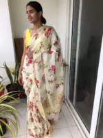 Offwhite Printed Linen Saree adorned with Zari Weaves