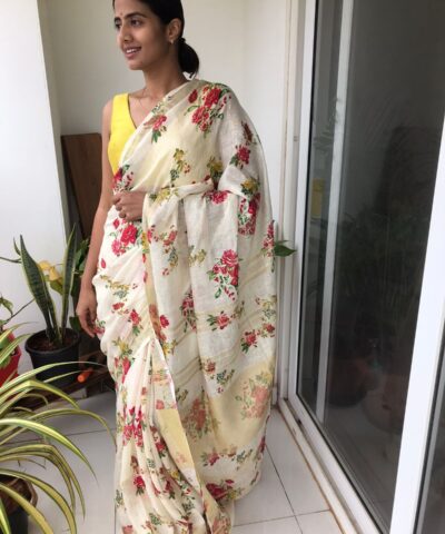 Offwhite Printed Linen Saree adorned with Zari Weaves