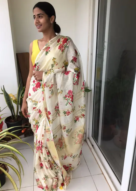 Offwhite Printed Linen Saree adorned with Zari Weaves