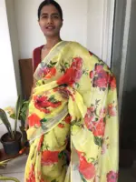 Lemon Yellow Printed Linen Saree adorned with Zari Weaves