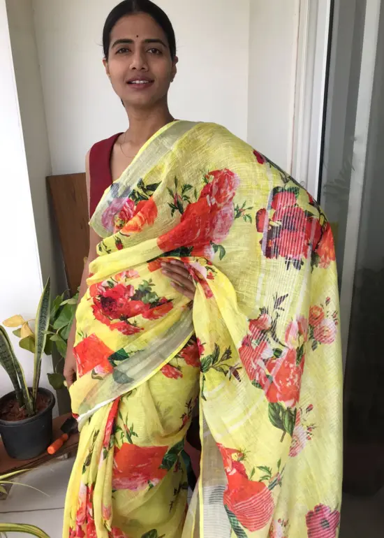 Lemon Yellow Printed Linen Saree adorned with Zari Weaves