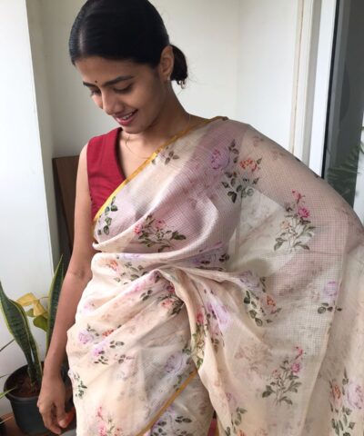 Cream Printed Kota Silk Saree highlighted with Zari Piping