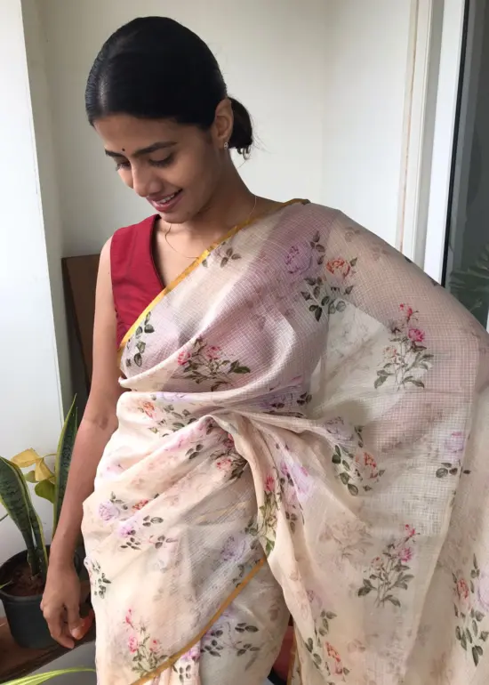 Cream Printed Kota Silk Saree highlighted with Zari Piping