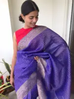 Royal Blue Organza Saree highlighted with Gold Weaves