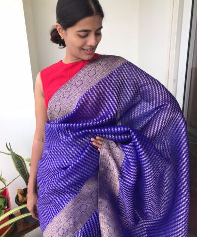 Royal Blue Organza Saree highlighted with Gold Weaves