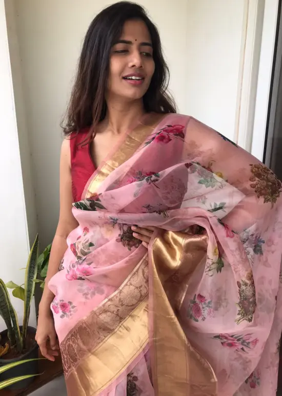 Creamy Pink Printed Organza Silk Saree highlighted with Kanchi Zari Border