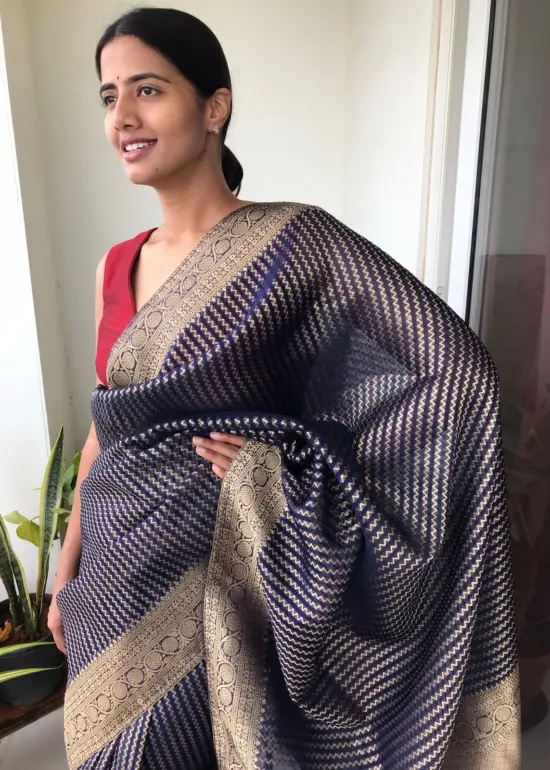 Navy Blue Organza Saree highlighted with Gold Weaves