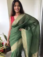 Bottle Green Organza Saree highlighted with Gold Weaves