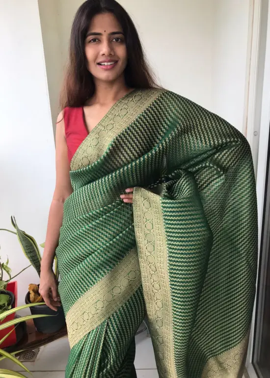 Bottle Green Organza Saree highlighted with Gold Weaves