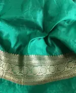 Bottle Green Organza Saree highlighted with Gold Zari and Meenakari Weaves - Image 6