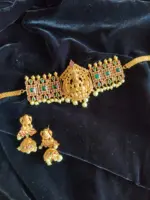 Matte Gold Choker Necklace Adorned with Lakshmi Goddess, Green and Red Kemp Stones