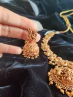 Antique Premium Gold Necklace Adorned with Lakshmi Goddess, White and Red Kemp Stones - Image 2