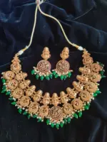 Premium Exclusive Gold Bridal Necklace Adorned with Lakshmi Goddess, Pakshi Pendants highlighted with Pearls and Green Beads and Real Kemp Stones