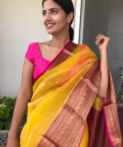 Yellow Organza Silk Saree highlighted with Kanchi Zari Border