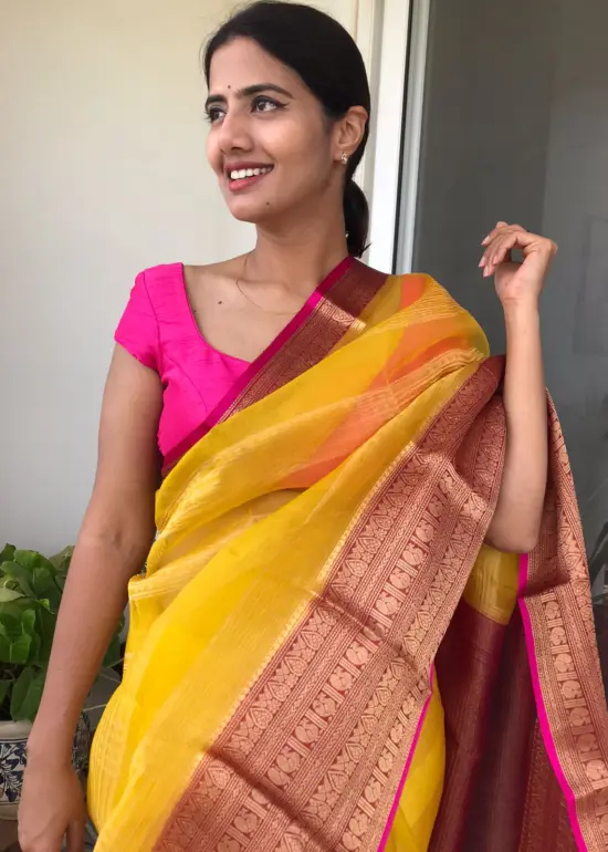 Yellow Organza Silk Saree highlighted with Kanchi Zari Border