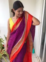 Purple Chiffon Silk Saree highlighted with Striped Body and contrast edging