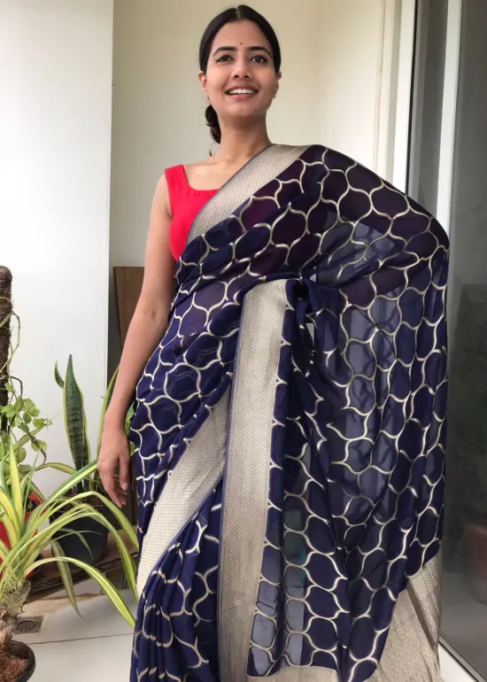 Navyblue Organza Saree highlighted with Mughal Inspired Zari Weaves