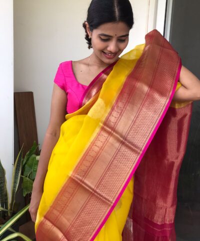 Yellow Organza Silk Saree highlighted with Kanchi Zari Border