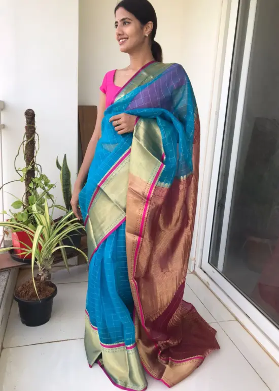 Blue Organza Silk Saree highlighted in Chequered Design with Kanchi Silk Zari Border