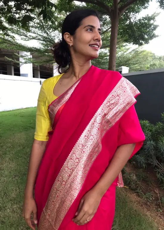 Fuschia Pink Chiffon Silk Saree adorned with Antique Zari Weaves