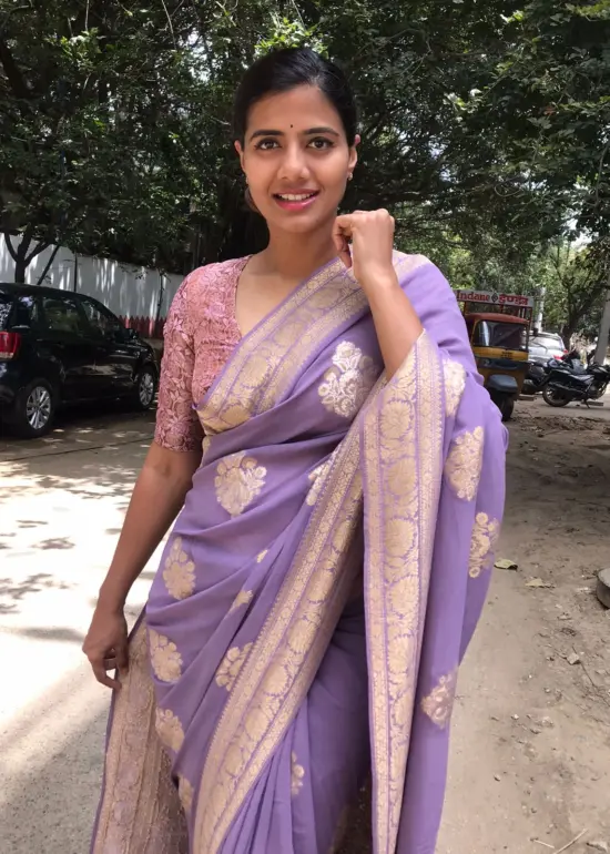 Lilac Banarasi Georgette Silk Saree highlighted with Meenakari Work