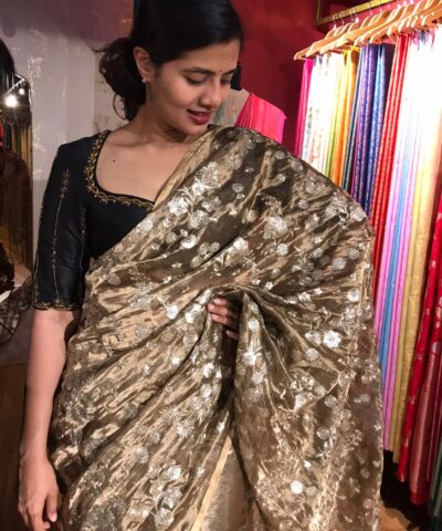 Metallic Tissue Silk Saree highlighted with Floral Embroidery