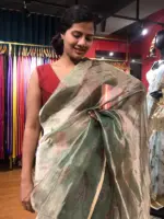 Sea Green Printed Tissue Silk Saree highlighted with Gold Piping (Copy)