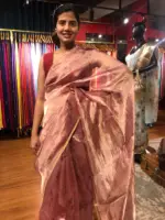 Blush Pink Printed Tissue Silk Saree highlighted with Gold Piping