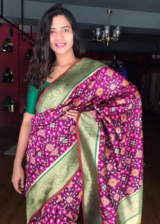 Wine Banarasi Silk Saree adorned with Beautiful Patola and Paithani Weaves