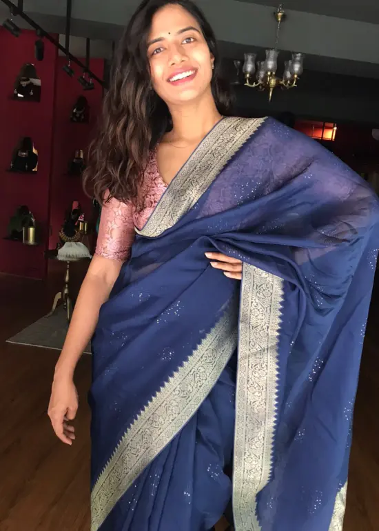 Navyblue Organza Silk Saree with Gold Zari Weaves highlighted with Sequins Embroidery