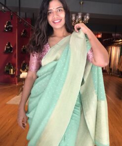 Mint Green Banarasi Georgette Silk Saree highlighted with Zari Buttas