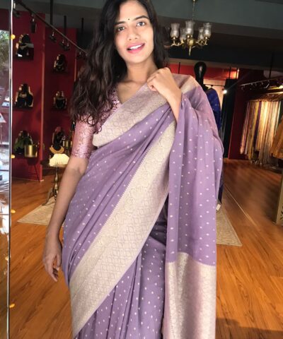 Lilac Banarasi Georgette Silk Saree highlighted with Zari Buttas