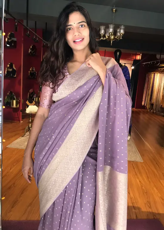 Lilac Banarasi Georgette Silk Saree highlighted with Zari Buttas