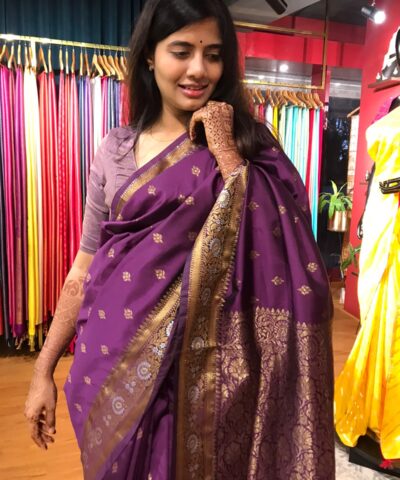 Purple Banarasi Silk Saree highlighted with Gold Weaves