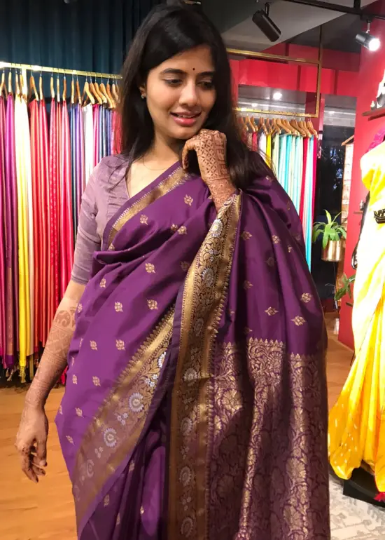 Purple Banarasi Silk Saree highlighted with Gold Weaves