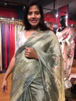 Sea Green Tissue Tussar Silk Saree highlighted with Silver Zari Checks