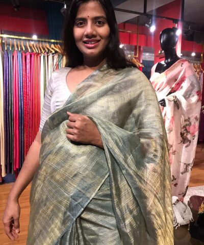 Sea Green Tissue Tussar Silk Saree highlighted with Silver Zari Checks